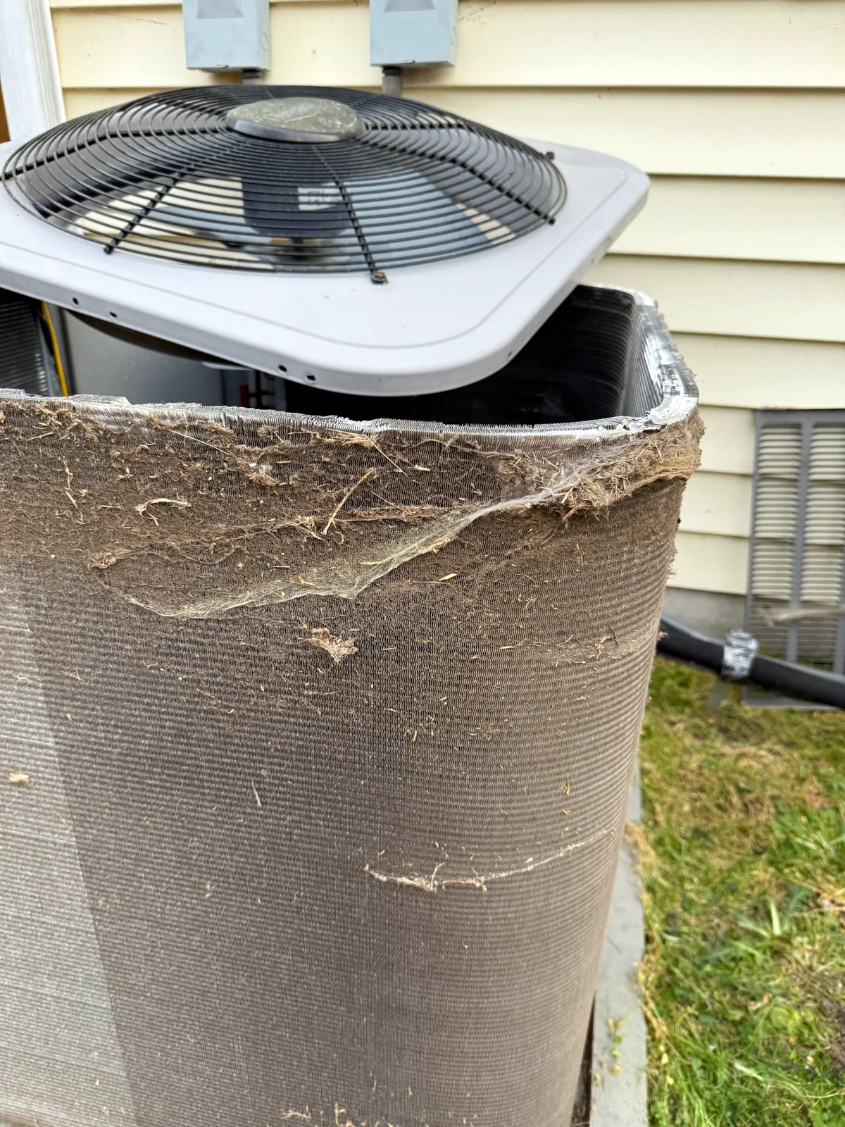 Clogged condenser coil before cleaning