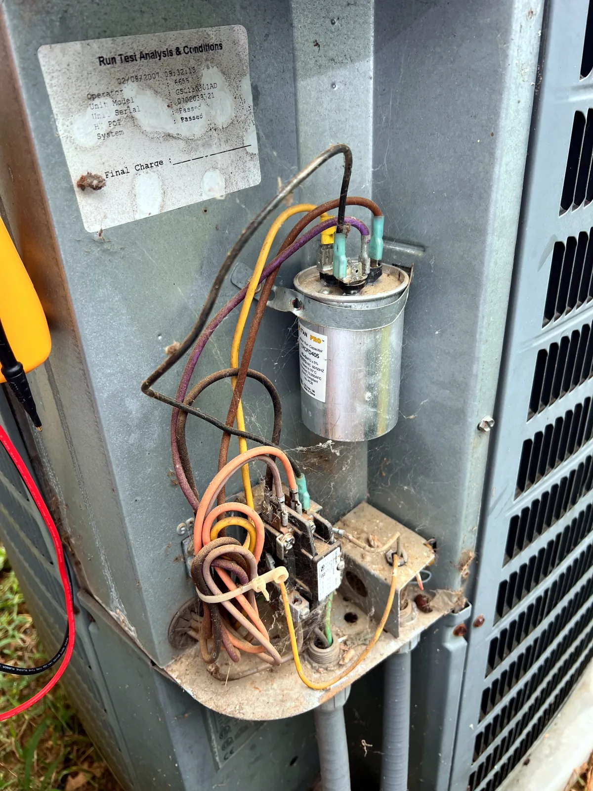 Before: failed capacitor and corroded contactor